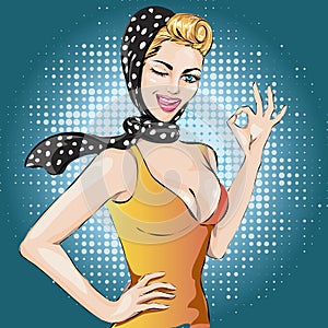 Pop Art winks woman with ok gesture . Pin-up girl.