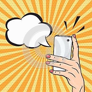 Pop art woman hand holding smart phone with speech bubble for text, telephone call concept in comic style