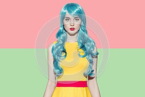 Pop art woman portrait wearing blue curly wig