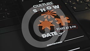 Pop culture. Event show date dedicated to Pop culture. Graphic presentation on smartphone screen. Male hand flapping