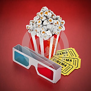 Popcorn, 3D glasses and cinema tickets on red background