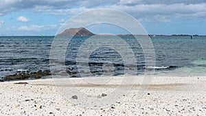 Popcorn beach in Corralejo on Fuerteventura with Lobos island