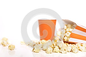 Popcorn box in front of white background, concept funfair and pa