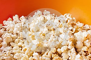 Popcorn in bright plastic bowl