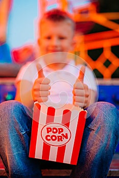 Popcorn child festival fair colorful background blur
