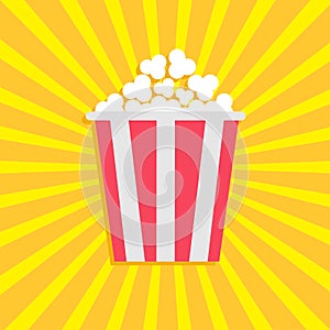 Popcorn. Cinema movie icon in flat design style. Starburst background