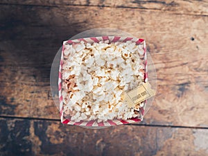 Popcorn and cinema ticket