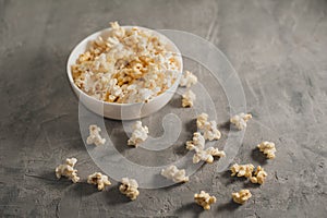 Popcorn on a concrete gray background