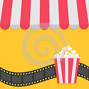 Popcorn. Film strip. Cinema icon. Striped store awning for shop, marketplace, cafe, restaurant. Red white canopy roof. Flat design photo