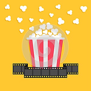 Popcorn. Film strip ribbon. Red yellow box. Cinema movie night icon in flat design style.