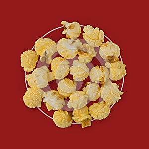 Popcorn flat lay composition on color background. cinema snack concept Modern style. creative photography. copy space