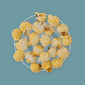 Popcorn flat lay composition on color background. cinema snack concept Modern style. creative photography. copy space