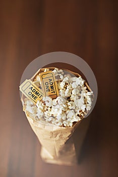 Popcorn, movie tickets and cinema food with event, entertainment and top view for date. Concert, film festival or circus