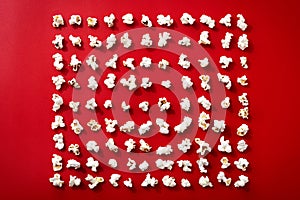 Popcorn pattern on red background