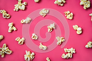 Popcorn pattern on red background on top view Sweet butter popcorn