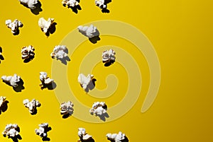 popcorn pattern on a yellow background with a hurd light