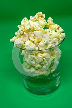 Popcorn is a snack that is a small portion of food generally eaten between meals