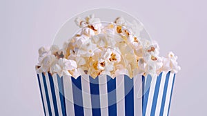 The popcorn in striped container.AI generated image