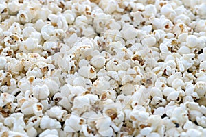 Popcorn texture background. Big amount of popcorn as pattern