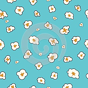 Popcorn vector seamless pattern on blue background. Popcorn is a delicious snack that you enjoy while watching movies