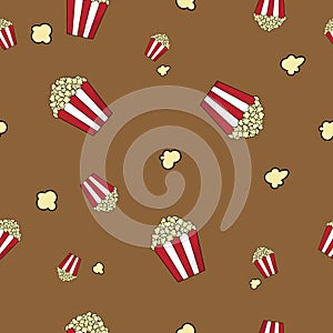 Popcorn vector seamless pattern on brown background. Popcorn is a delicious snack that you enjoy while watching movies