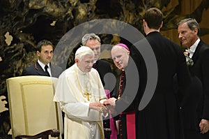 Pope Benedict greets Archbishop Aquila