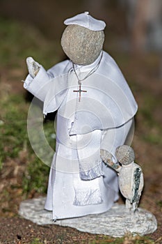 Pope francis small stone statue photo