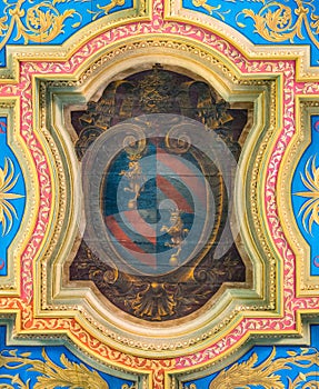 Pope Pius IX coat of arms in the ceiling of the Basilica of Sant`Anastasia near the Palatine in Rome, Italy.