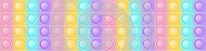 Popit wide background a cartoon trendy silicon fidget toys. Addictive antistress toy in pastel colors. Bubble sensory photo