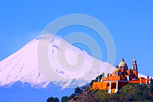 Popocatepetl volcano and church in cholula, puebla, mexico II