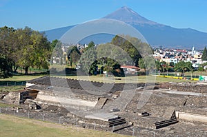 Popocatepetl volcano and ruins of Great Pyramid of Cholula, , Mexico. View from Church of Virgin of the remedies in Cholula