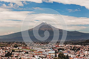 Popocatepetl Volcano and view of Cholula town in Puebla Mexico photo