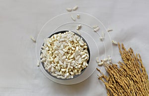 Popped Rice or Nel Pori also known as Puffed Lahi or Karthigai Pori in wooden bowl