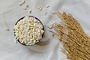 Popped Rice or Nel Pori also known as Puffed Lahi or Karthigai Pori in wooden bowl