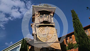 Poppet beats bell on Clock Tower of Rezo Gabriadze, unique tourist attraction