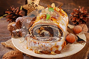 Poppy seed cake for christmas on wooden table