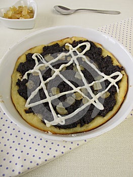 Poppy seed cake with succade and sugar glaze