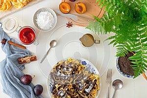 Poppy seed noodles and plum compote, Czech traditional dessert