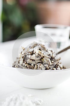 Poppy seed pasta with powder sugar