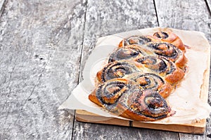 Poppy seed roll freshly baked on the table