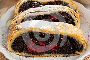 Poppy seed strudel with cherry