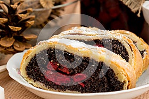 Poppy seed strudel with cherry