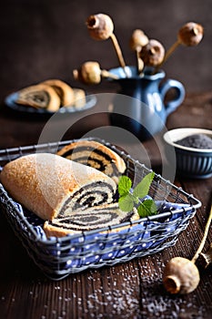 Poppy seed strudel sprinkled with powdered sugar