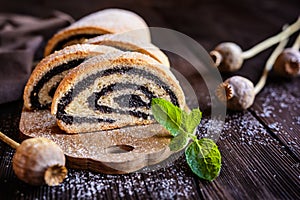 Poppy seed strudel sprinkled with powdered sugar