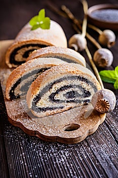 Poppy seed strudel sprinkled with powdered sugar