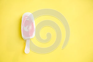 Popsicle with fresh raspberry on a table