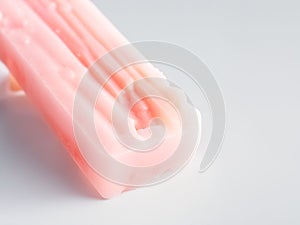 Popsicle ice cream. Fruit popsicle. Cold ice cream close-up on a light. AI generated
