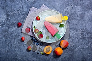 Popsicles  ice cream with fruits and berries, summer dessert, natural vegan and vegetarian homemade sweets