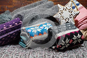 The popular Christmas gift for a woman - a woolen scarf,stocks and gloves
