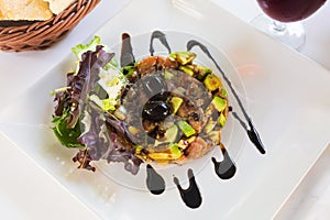 Popular dish of French cuisine is smoked salmon tartare with avocado